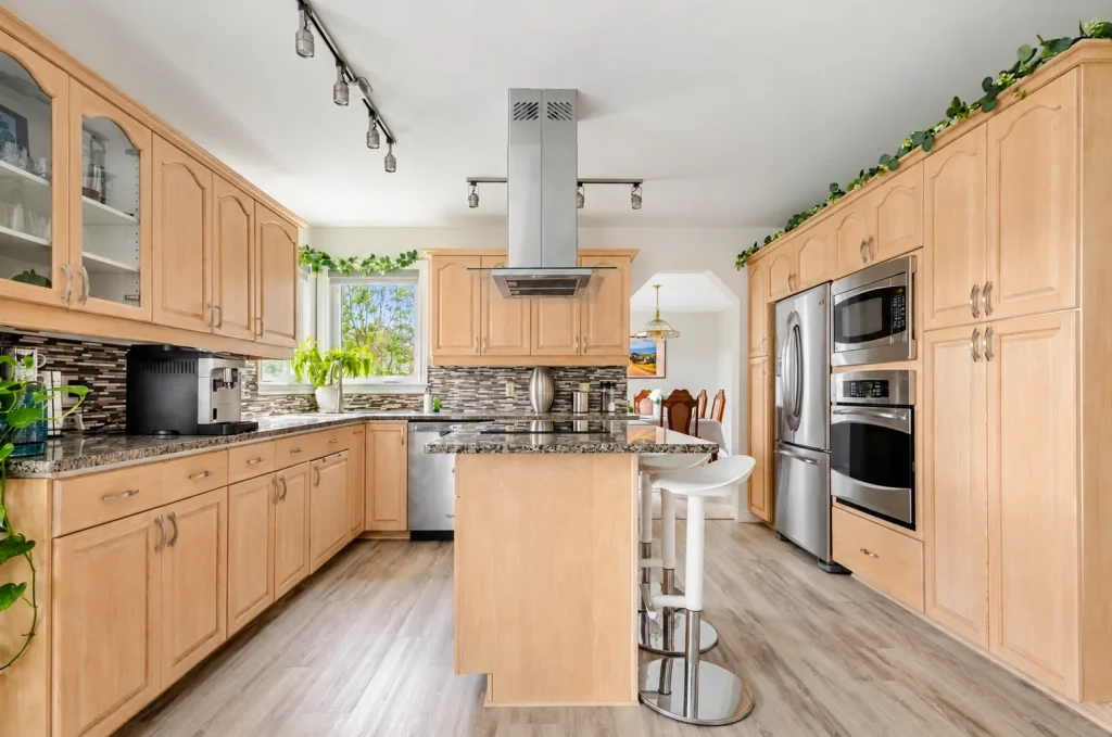 Kitchen with central island and wooden cabinets