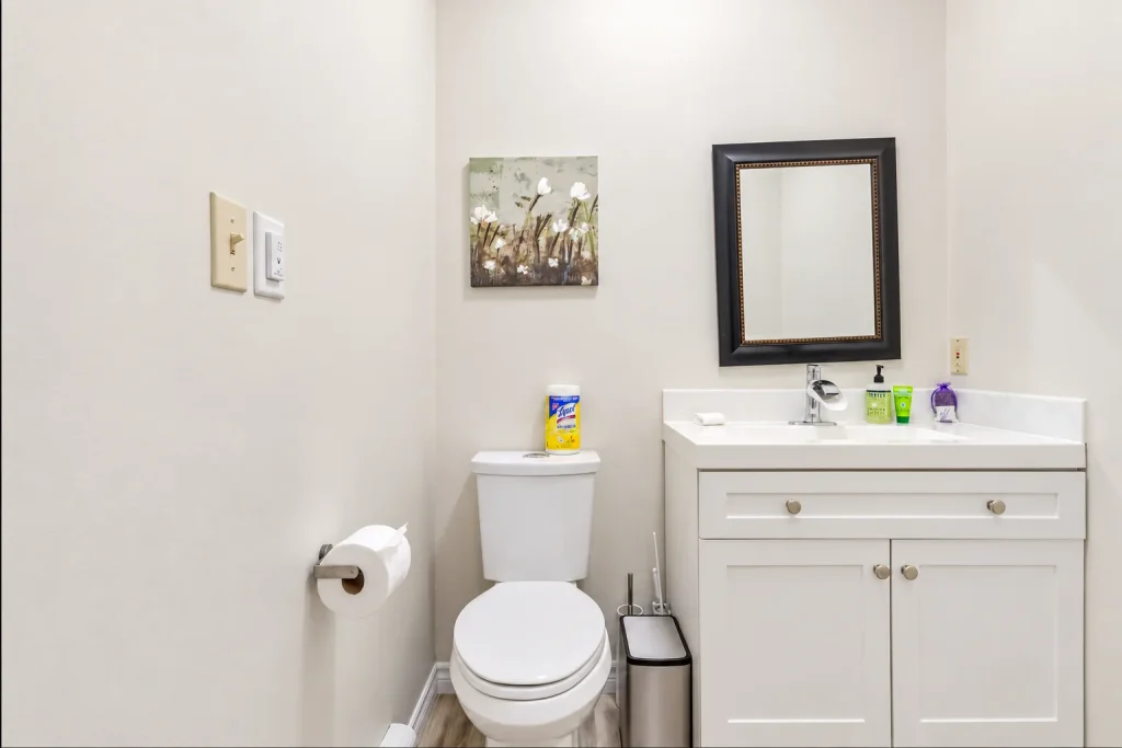 Powder room with toilet and vanity